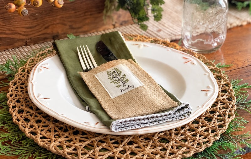 Cutlery Couture assorted herbs silverware pouch and woven vine plate charger on an autumn themed table setting